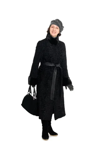 Mulher sorridente em um casaco de peles de broadtail — Fotografia de Stock
