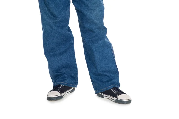 Men's jeans and gumshoes. — Stock Photo, Image