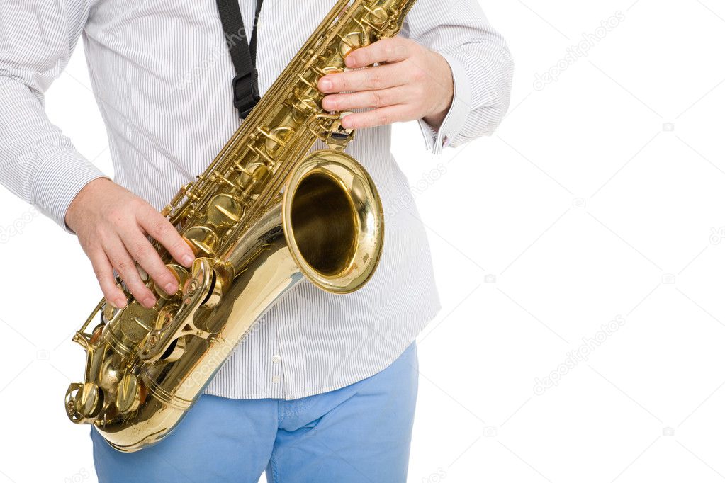 Hands musician playing the saxophone
