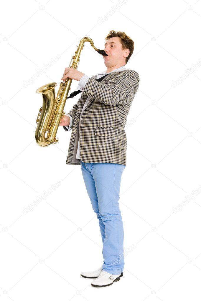 A young musician plays the saxophone