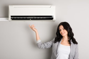 Young woman showing air conditioner clipart