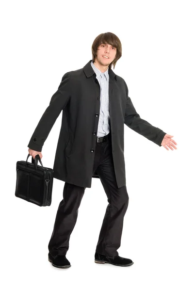Joven hombre de negocios en un impermeable — Foto de Stock