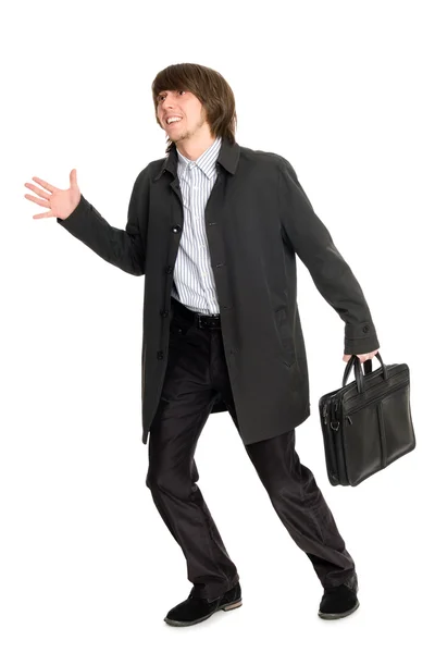 Running a business man in a raincoat — Stock Photo, Image