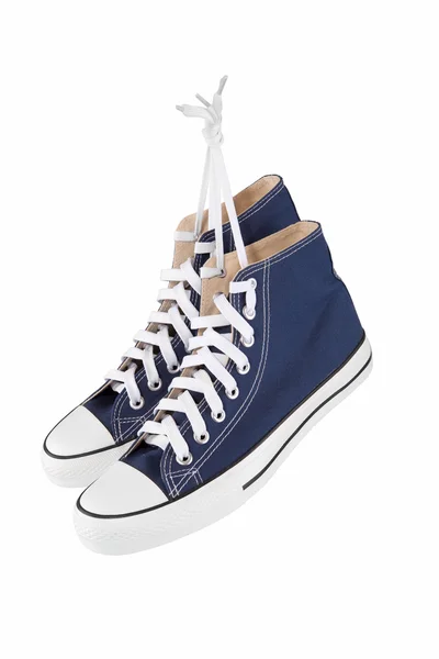 Paar nieuwe blauwe sneakers — Stockfoto