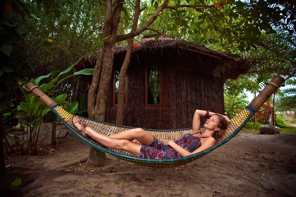 Woman in a hammock — Stock Photo, Image