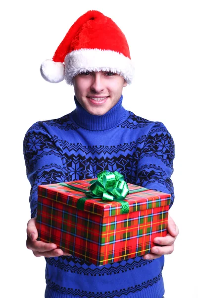 Man in rode hoed met cadeau — Stockfoto