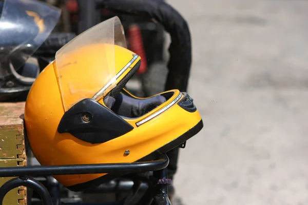 stock image Yellow motobike helmet