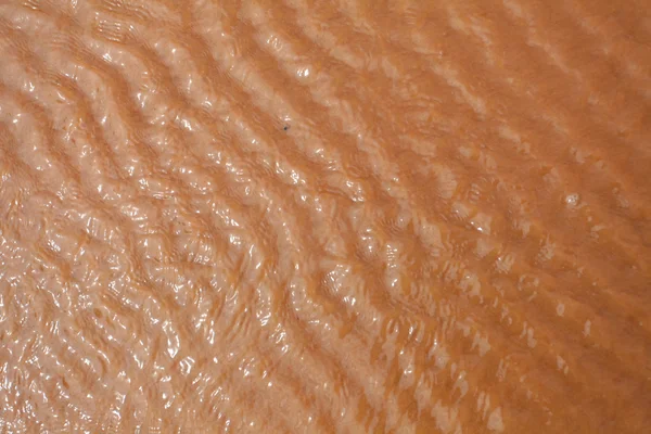 Textur des roten Sandes — Stockfoto