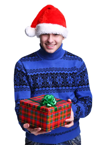 Man in rode hoed met cadeau — Stockfoto