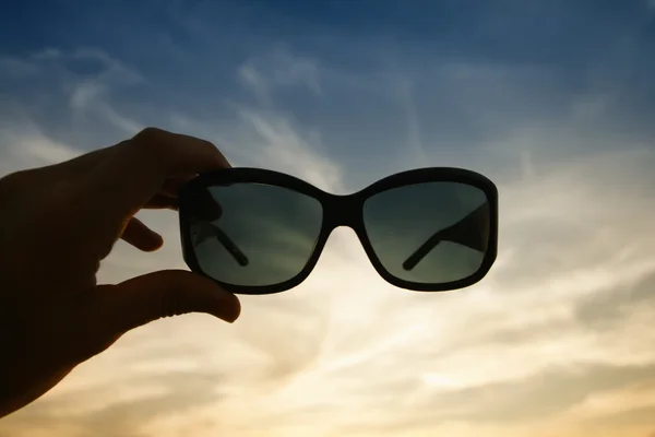 Glasses and sunset — Stock Photo, Image