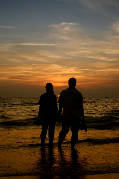Couple and sunset — Stock Photo, Image