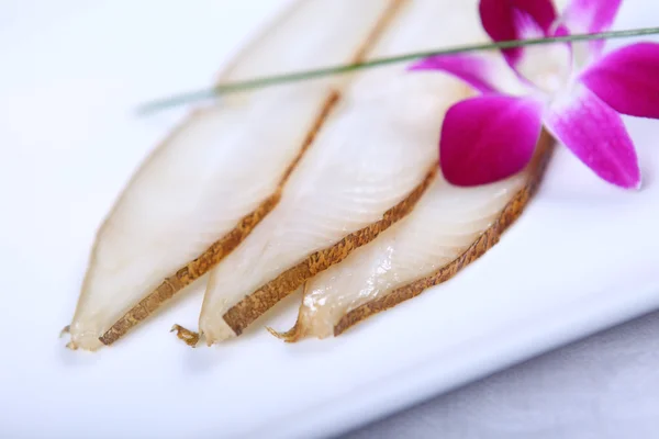 stock image White fish and flower