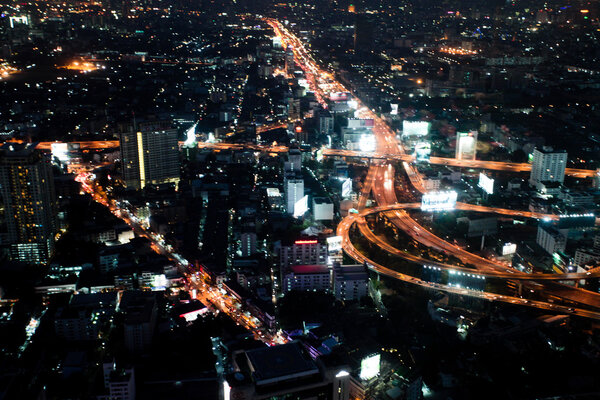 Night a big modern city with highways, top view