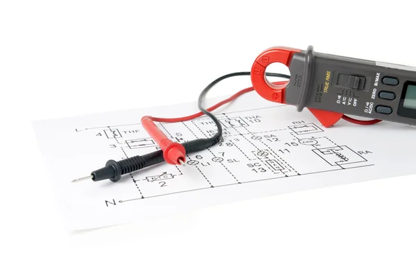 Digital multimeter and the circuit. — Stock Photo, Image