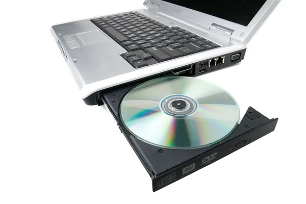 DVD na laptopie. — Zdjęcie stockowe