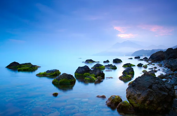 Sea stones at sunset — Stock Photo, Image