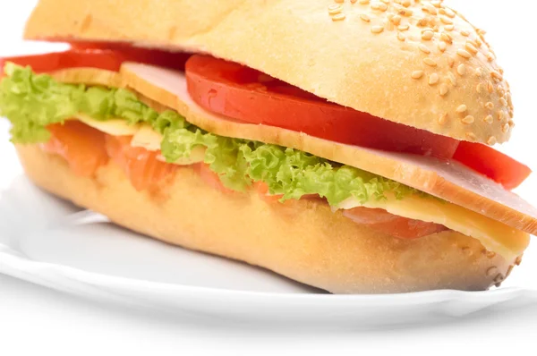 stock image Big sandwich on white plate