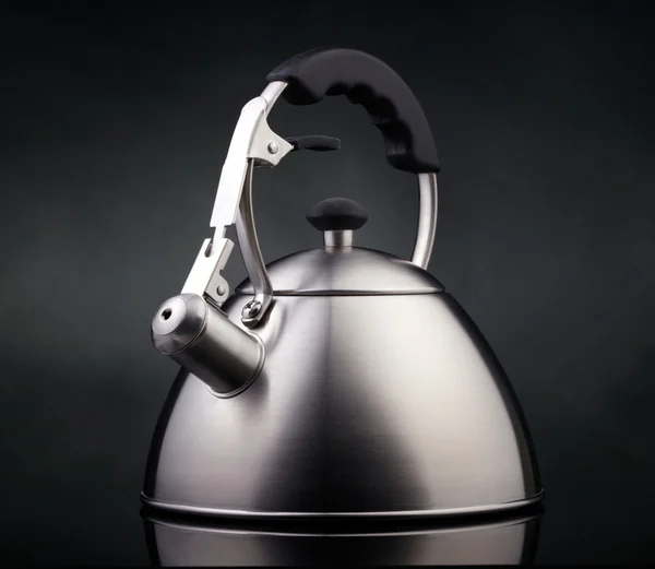 Tea kettle over dark background — Stock Photo, Image