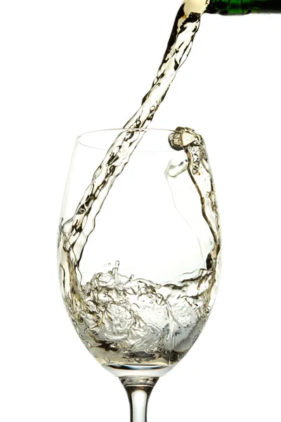 White wine pouring into glass — Stock Photo, Image