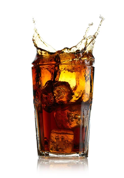 Splashing cola in glass. Isolated on white background — Stock Photo, Image