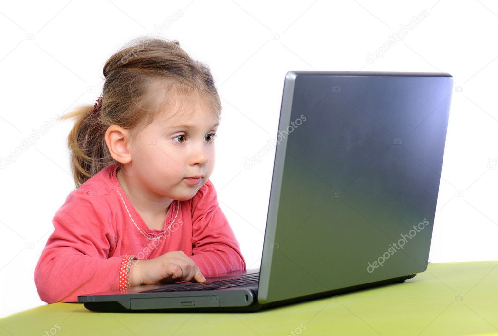 Little girl wih laptop