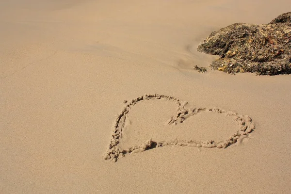 Kalp kumsalda — Stok fotoğraf
