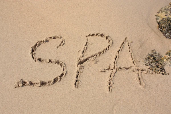 砂浜のビーチの上の単語 — ストック写真