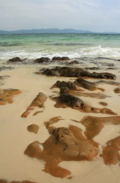 Stones on the tropical beach — Stock Photo, Image
