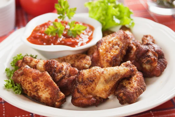 Chicken wings with chili sauce — Stock Photo, Image