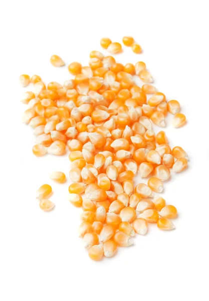Кукурузные семечки на белом — стоковое фото