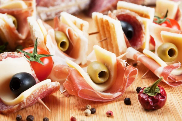 Prosciutto and salami canape — Stock Photo, Image