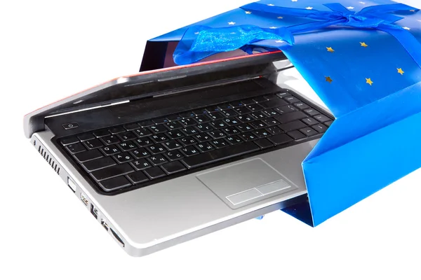 The laptop in a gift package — Stock Photo, Image