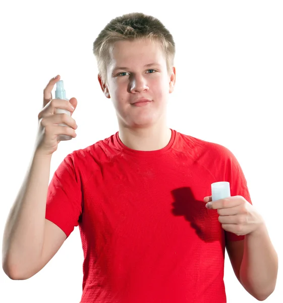 Teenager with a cream for a problem youthful skin, against spots — Stock Photo, Image