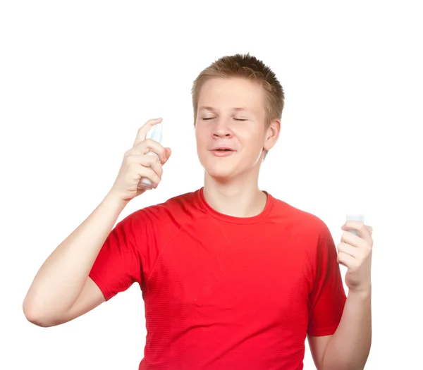 Teenager spraying fragrance perfume — Stock Photo, Image