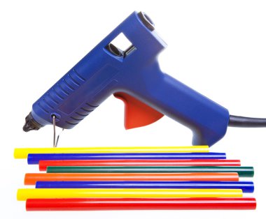 Intsrument for repair and design works - the glutinous gun and color cores clipart