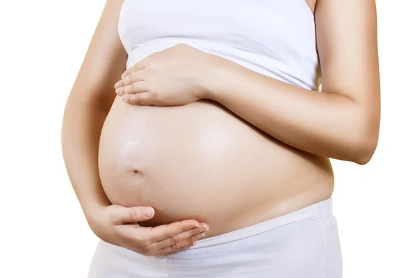 Mujer embarazada cuidar de su vientre —  Fotos de Stock