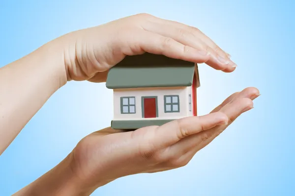 stock image Home in human hands