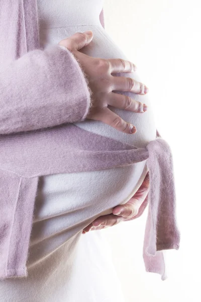 Pregnant woman take care about her belly — Stock Photo, Image