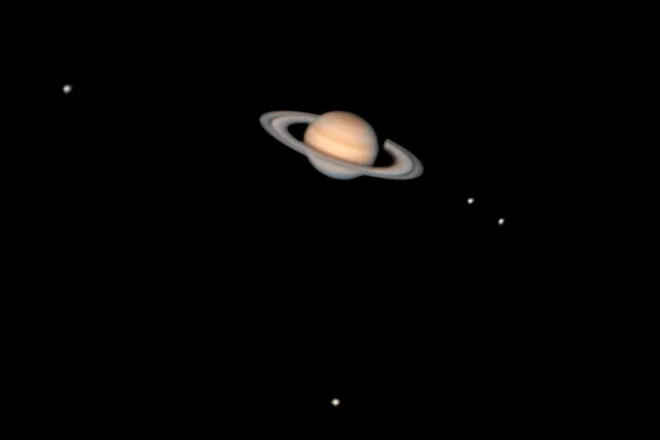 stock image Real Image of Saturn and moons (Titan, rhea, thetis, and dione )