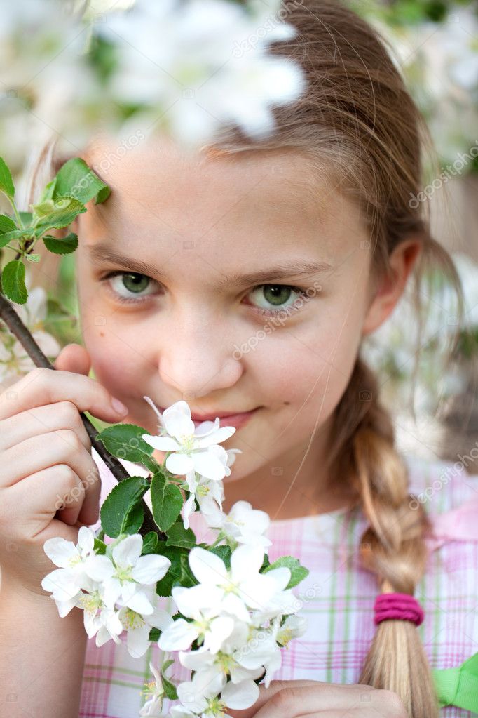 Beautiful Girl in the flowers garden