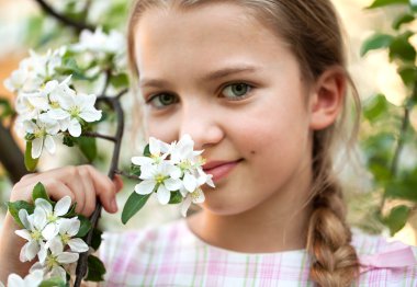 Beautiful Girl in the flowers garden clipart