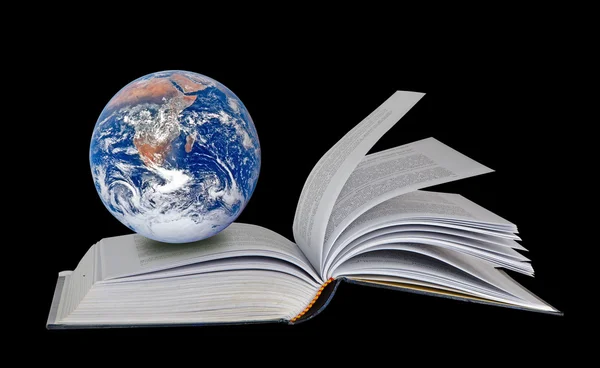 stock image Planet Earth on book.Elements of this image furnished by NASA