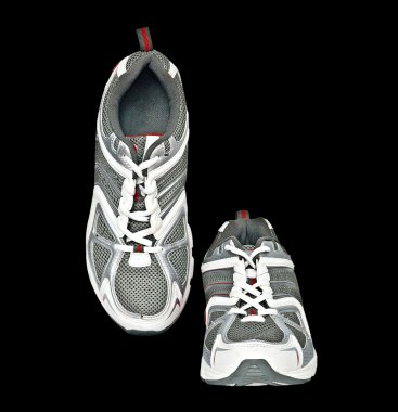 Beyaz arkaplanda izole edilmiş spor ayakkabılar