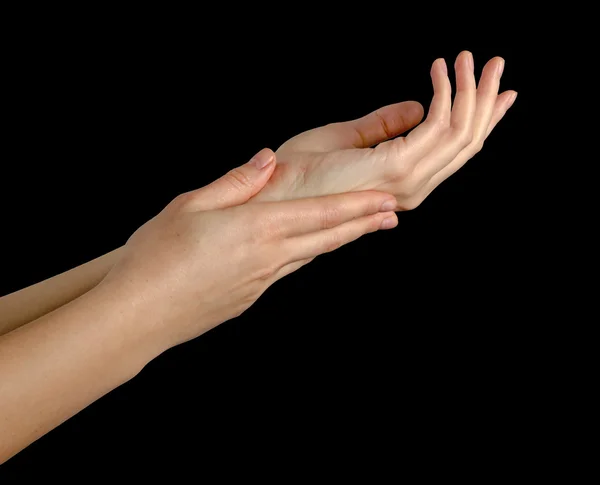 Bautiful manos sobre fondo negro — Foto de Stock