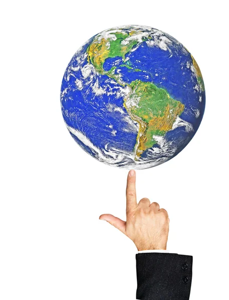 Planeet aarde op vinger — Stockfoto