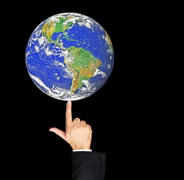 Planeta Tierra en el dedo — Foto de Stock