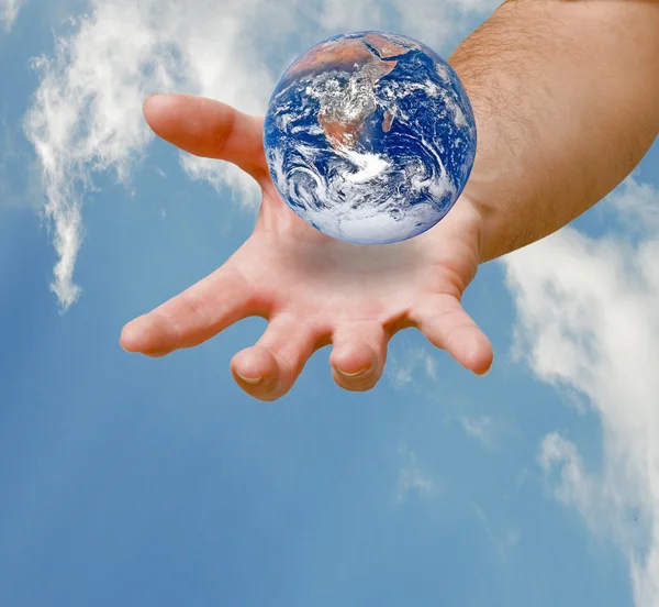 Planet earth on palm.Elements of this image furnished by NASA — Stock Photo, Image