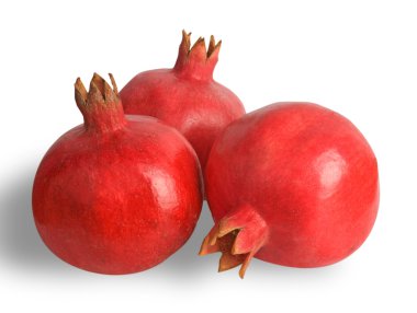 Three ripe pomegranates isolated on white background clipart