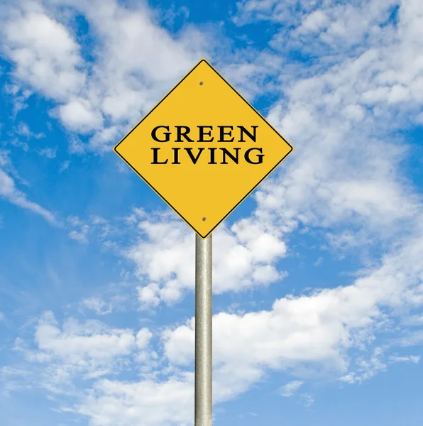 緑の暮らしへの道路標識 — ストック写真