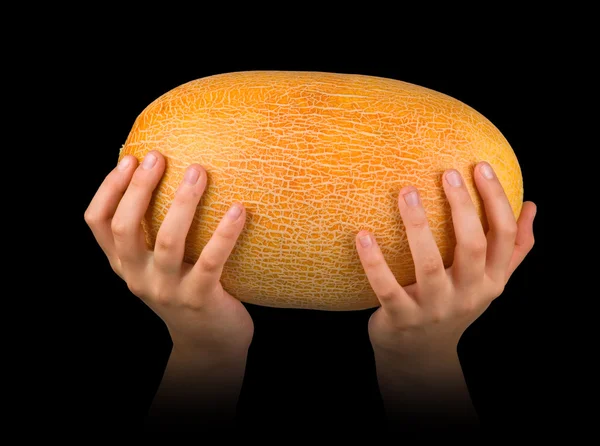 Melone in mani isolate su sfondo nero — Foto Stock